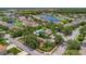Community overview featuring a pool, playground, and pond at 6122 44Th E Ct, Bradenton, FL 34203
