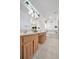 Double vanity bathroom with large mirror and garden tub at 6122 44Th E Ct, Bradenton, FL 34203