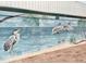 Attractive community mural depicting marine wildlife at 1806 Brook Field Ter, Sarasota, FL 34234