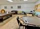 Community game room with pool table and card tables at 1806 Brook Field Ter, Sarasota, FL 34234