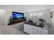 Comfortable loft with sectional sofa and large screen TV at 9478 Tequila Sunrise Dr, Sarasota, FL 34241