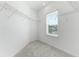 Large walk-in closet with wire shelving and window at 9478 Tequila Sunrise Dr, Sarasota, FL 34241