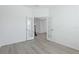 Bright office space with double doors and grey flooring at 9478 Tequila Sunrise Dr, Sarasota, FL 34241