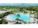 Relaxing aerial view of the resort-style pool and lounge area at 9478 Tequila Sunrise Dr, Sarasota, FL 34241