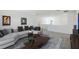 Spacious loft with sectional sofa and coffee table at 9478 Tequila Sunrise Dr, Sarasota, FL 34241