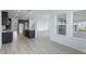 Modern kitchen features stainless steel appliances and an island at 9478 Tequila Sunrise Dr, Sarasota, FL 34241