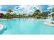Large resort-style pool with plenty of lounge chairs at 9478 Tequila Sunrise Dr, Sarasota, FL 34241