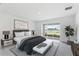 Spacious bedroom with sliding glass doors leading to a backyard view at 9478 Tequila Sunrise Dr, Sarasota, FL 34241