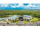 Aerial view of the community clubhouse and pool area at 9478 Tequila Sunrise Dr, Sarasota, FL 34241