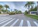 Entrance to Palm Lakes community with signage and pedestrian crossing at 7823 33Rd E St # 20, Sarasota, FL 34243