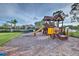 playground with playset and picnic tables at 7823 33Rd E St # 20, Sarasota, FL 34243
