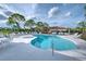 Community pool with plenty of lounge chairs for relaxing at 7823 33Rd E St # 20, Sarasota, FL 34243