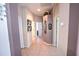 Bright hallway with tile floors and access to bedrooms at 7823 33Rd E St # 20, Sarasota, FL 34243