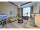 Living room with two sofas, a coffee table, and large window at 7823 33Rd E St # 20, Sarasota, FL 34243