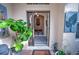 Home entry with a decorative wall fountain and console table at 7823 33Rd E St # 20, Sarasota, FL 34243