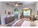 Bright bedroom with a desk area and large bed at 7823 33Rd E St # 20, Sarasota, FL 34243