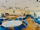 Spacious community room with tables and chairs at 1806 Brook Field Ter, Sarasota, FL 34234