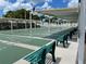 Community shuffleboard courts with covered seating areas at 1806 Brook Field Ter, Sarasota, FL 34234