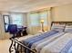 Bedroom with a bed, desk, and window coverings at 1806 Brook Field Ter, Sarasota, FL 34234