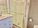 Clean bathroom with a shower, sink, and toilet at 1806 Brook Field Ter, Sarasota, FL 34234