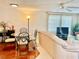Small dining area with glass-top table and four chairs at 1806 Brook Field Ter, Sarasota, FL 34234