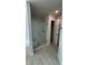 Bathroom with a large glass shower and tile floor at 2620 Averland Loop, North Port, FL 34287