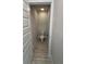Small powder room with toilet and tile flooring at 2620 Averland Loop, North Port, FL 34287