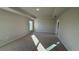 Bright and airy bedroom with carpeted floor and large window at 2620 Averland Loop, North Port, FL 34287