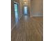 Bright and spacious entryway with wood-look tile flooring at 2620 Averland Loop, North Port, FL 34287