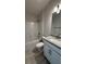 Bathroom with single vanity, shower/tub combo, and granite countertop at 2624 Averland Loop, North Port, FL 34287