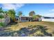 View of home from the backyard with grassy area at 427 Washington Ave, Osprey, FL 34229