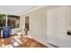 Cozy screened porch with terracotta tile floor at 427 Washington Ave, Osprey, FL 34229