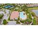 Community pool, tennis courts, and playground at 5585 Semolino St, Nokomis, FL 34275