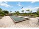 Two bocce ball courts with landscaping at 5585 Semolino St, Nokomis, FL 34275