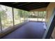 Spacious screened porch with concrete flooring at 2708 Starlite Ln, Port Charlotte, FL 33952