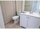 Clean bathroom with a shower, toilet, and white vanity at 2708 Starlite Ln, Port Charlotte, FL 33952