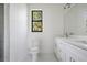 Clean bathroom with double vanity and marble flooring at 14390 Maddock Ave, Port Charlotte, FL 33953