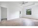 Bright bedroom with wood floors and large window at 14390 Maddock Ave, Port Charlotte, FL 33953