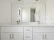 Modern bathroom with double vanity and quartz countertops at 14390 Maddock Ave, Port Charlotte, FL 33953