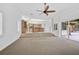 Spacious Gathering room with built-in cabinetry and pool view at 909 Macewen Dr, Osprey, FL 34229