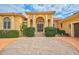 Elegant home with double doors and circular driveway at 909 Macewen Dr, Osprey, FL 34229