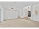 Bright living room with view of entryway and high ceilings at 909 Macewen Dr, Osprey, FL 34229