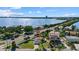 Aerial view showcasing a house's location near water at 1160 Morningside Pl, Sarasota, FL 34236