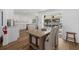Kitchen dining area with view of the pool and patio at 1160 Morningside Pl, Sarasota, FL 34236
