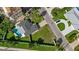 House with private pool and lush green landscaping at 1160 Morningside Pl, Sarasota, FL 34236