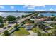 Aerial view of single-story home with fenced yard, near water at 1160 Morningside Pl, Sarasota, FL 34236