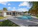 Inviting kidney-shaped pool with screened patio at 1160 Morningside Pl, Sarasota, FL 34236