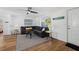 Comfortable living room featuring a sectional sofa and ceiling fan at 1160 Morningside Pl, Sarasota, FL 34236