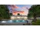 Evening view of the pool and patio area at 1160 Morningside Pl, Sarasota, FL 34236