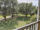 Scenic view of the property's grounds from the screened-in lanai at 6414 Moorings Point Cir # 201, Lakewood Ranch, FL 34202